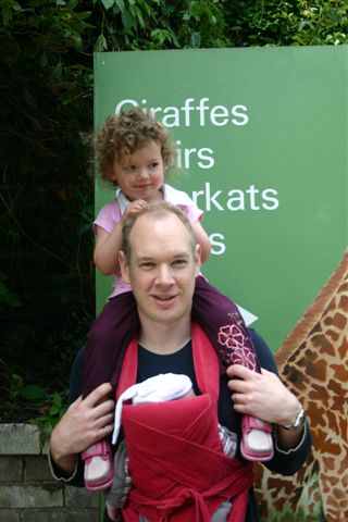 Daddy holding Anna and Nate at the London Zoo