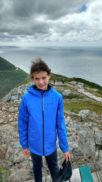 Anna, aged 14, reaches the summit.